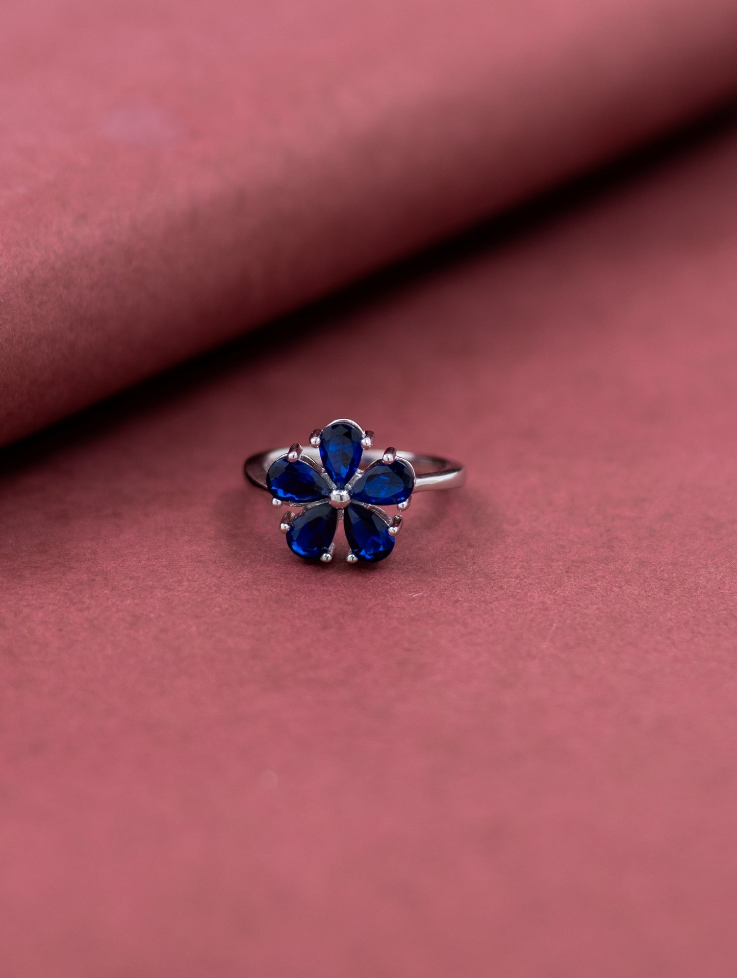 Blue stone floral sterling silver ring